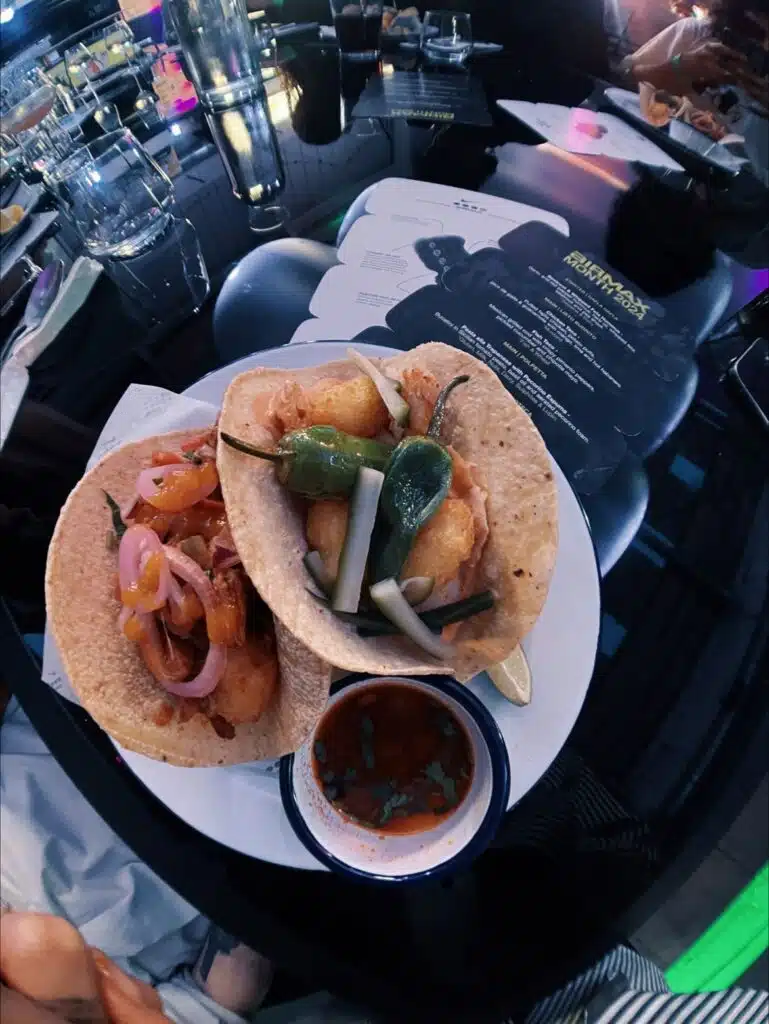 Street food served with a printed menu at the Sevenstore Baltic Market event