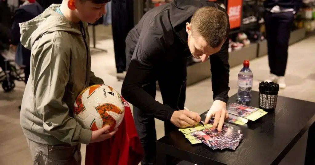 Customers at a Footasylum Wrexham FC signing event