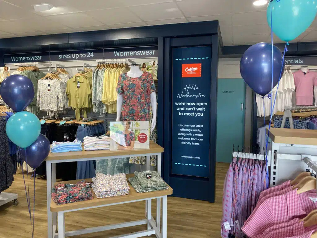Cotton Traders store interior with clothing displays