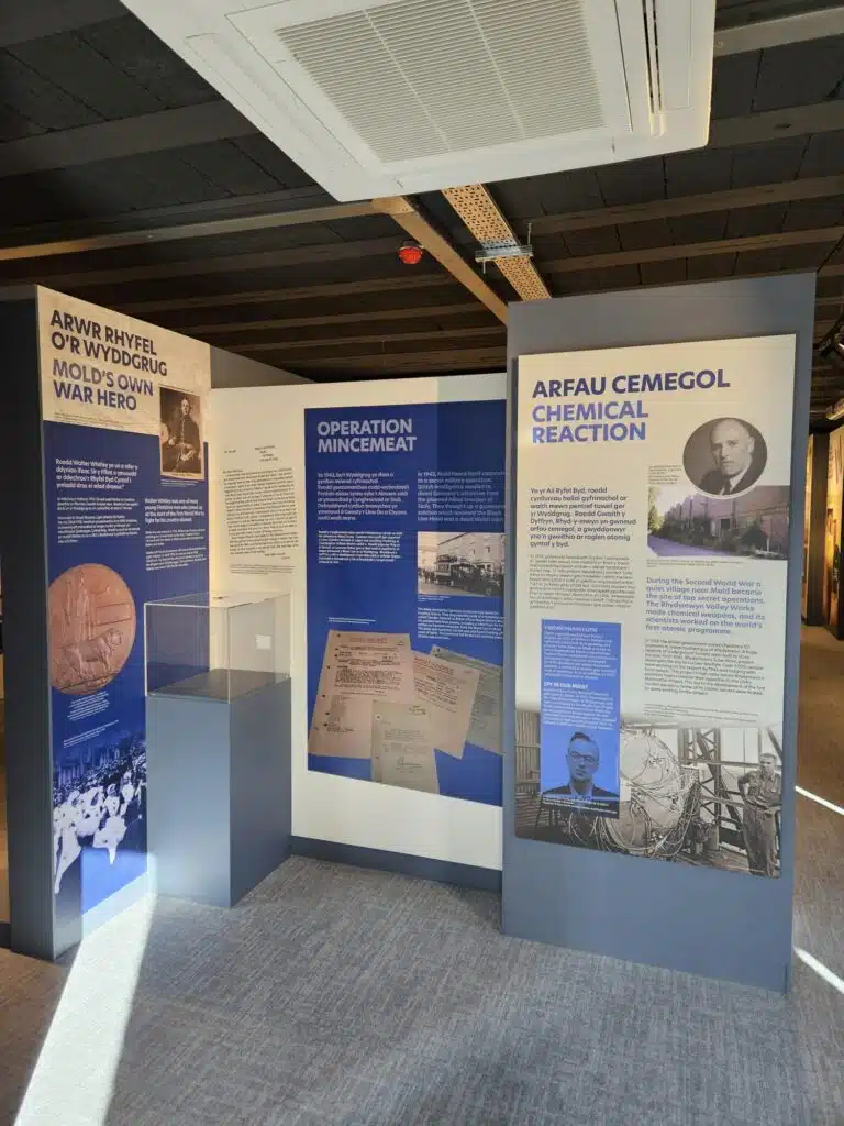 Bilingual Welsh and English history display panels at Mold Museum