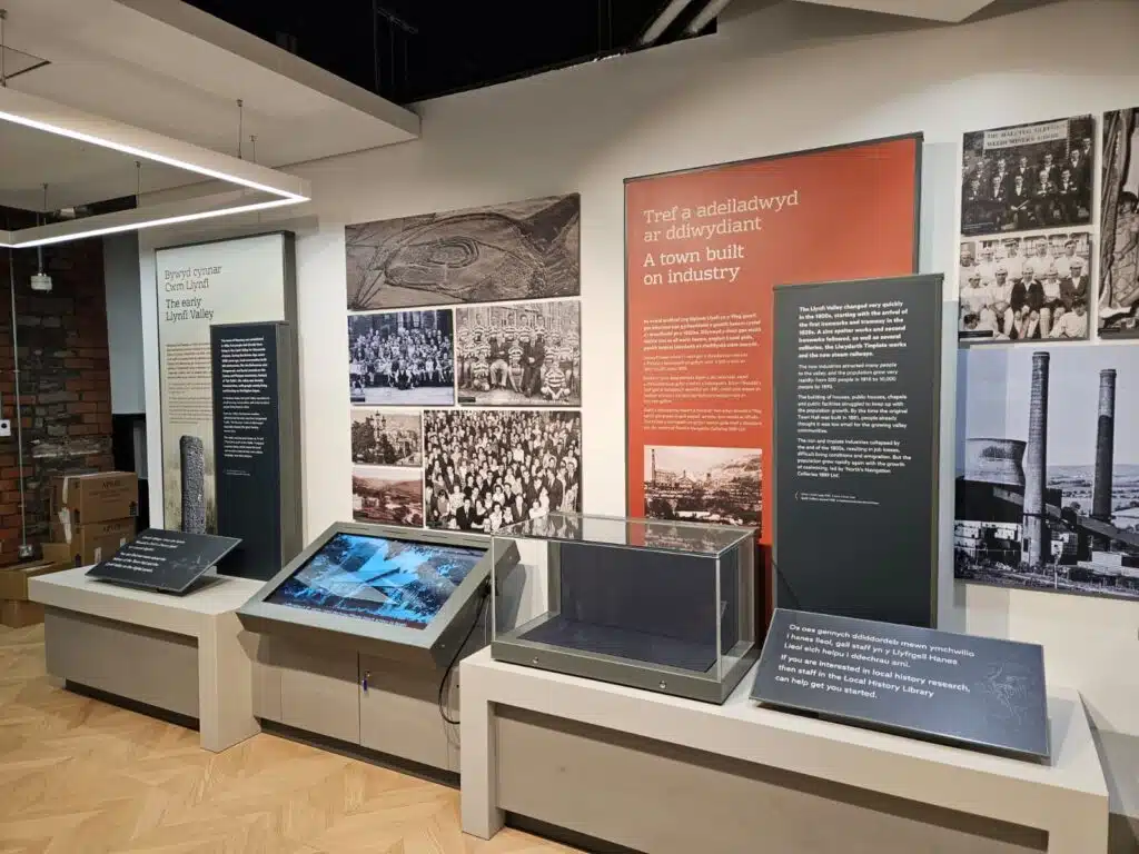 Heritage exhibition space with display cases and photo panels at Maesteg Town Hall