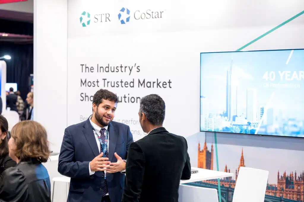 Delegates at an STR branded stand at the Annual Hospitality Conference