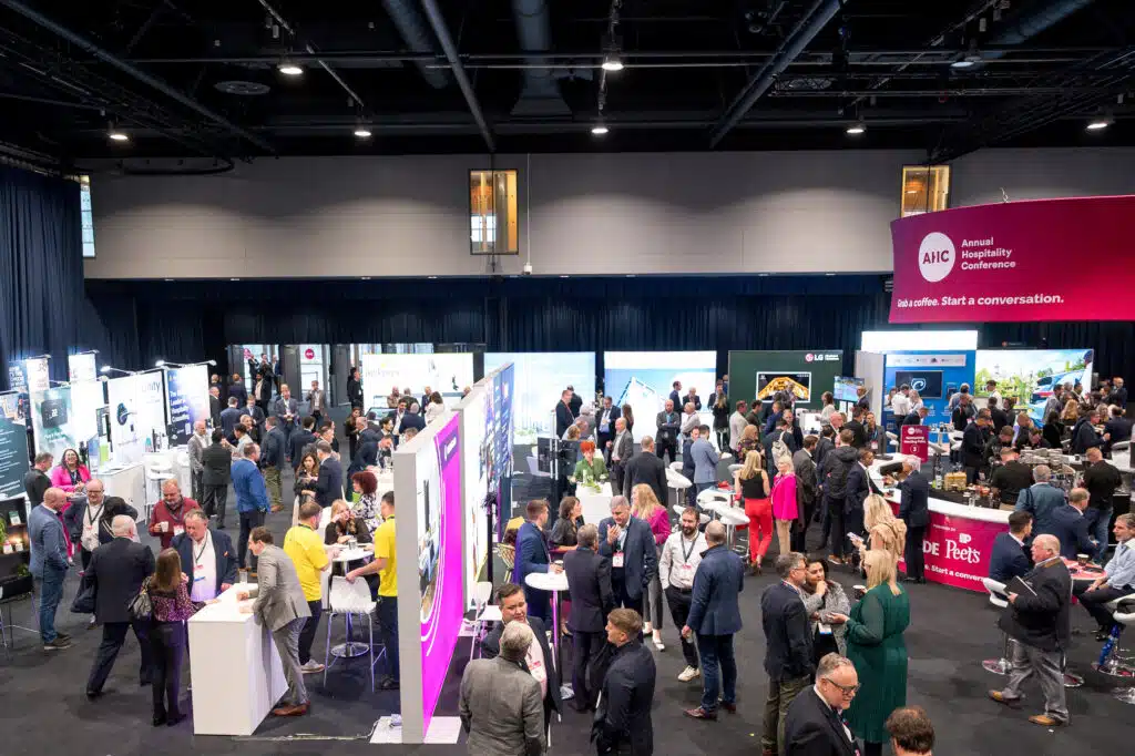 Busy exhibition hall at the Annual Hospitality Conference