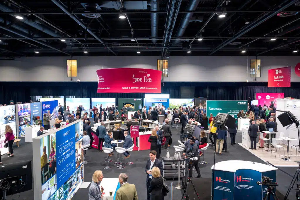 Exhibition stands and hanging banners at the Annual Hospitality Conference