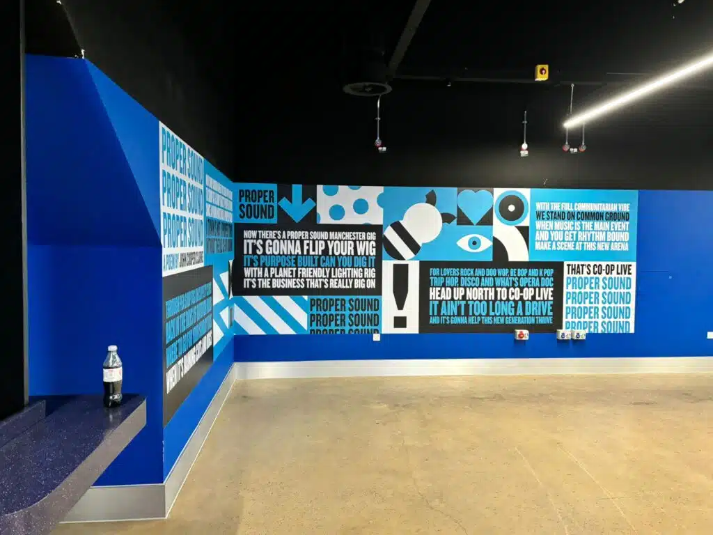 Co-op Live blue typographic internal wall graphics