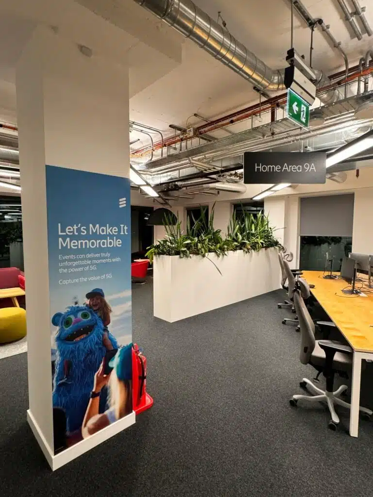 Ericsson 'Let's Make it Memorable' column wrap in an office