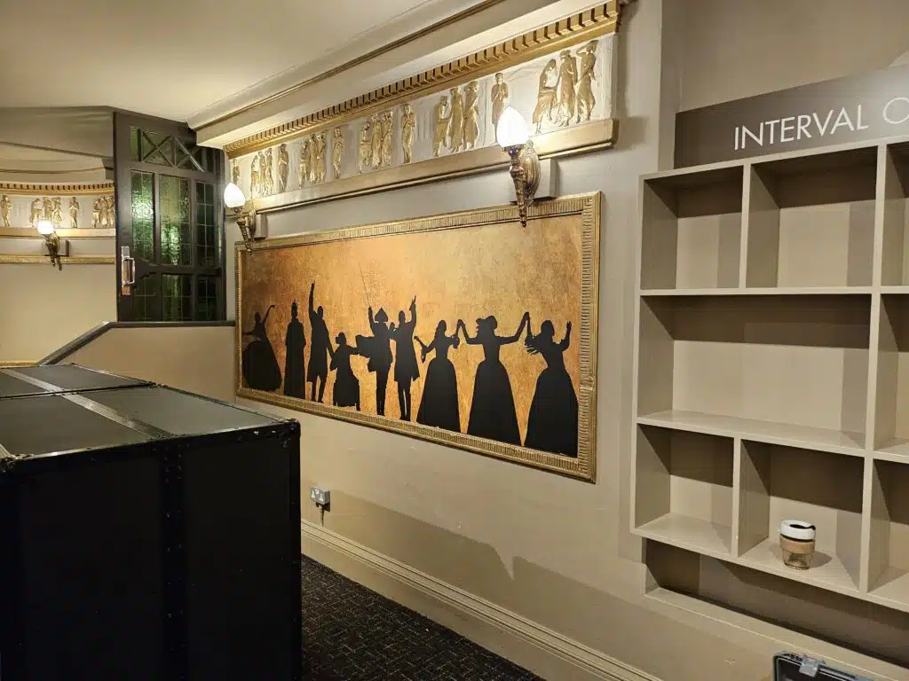 Hamilton silhouette wall graphic in a theatre bar area