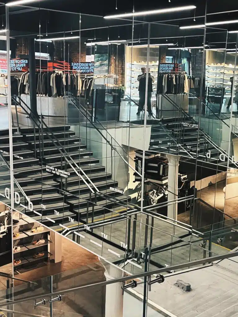 Sevenstore flagship interior with glass staircase