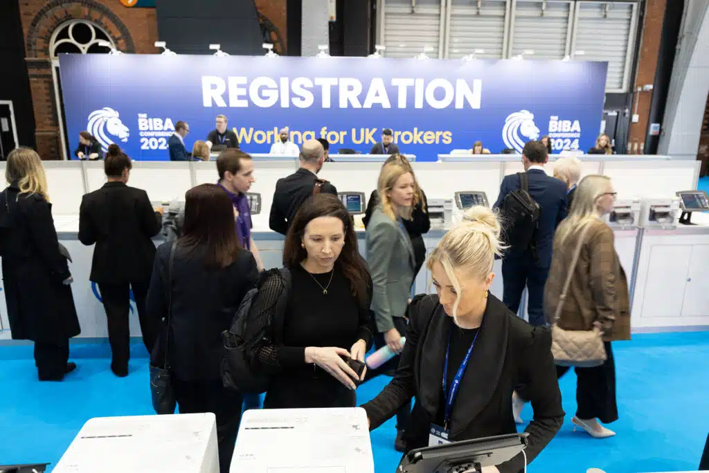 BIBA registration desk with overhead branding