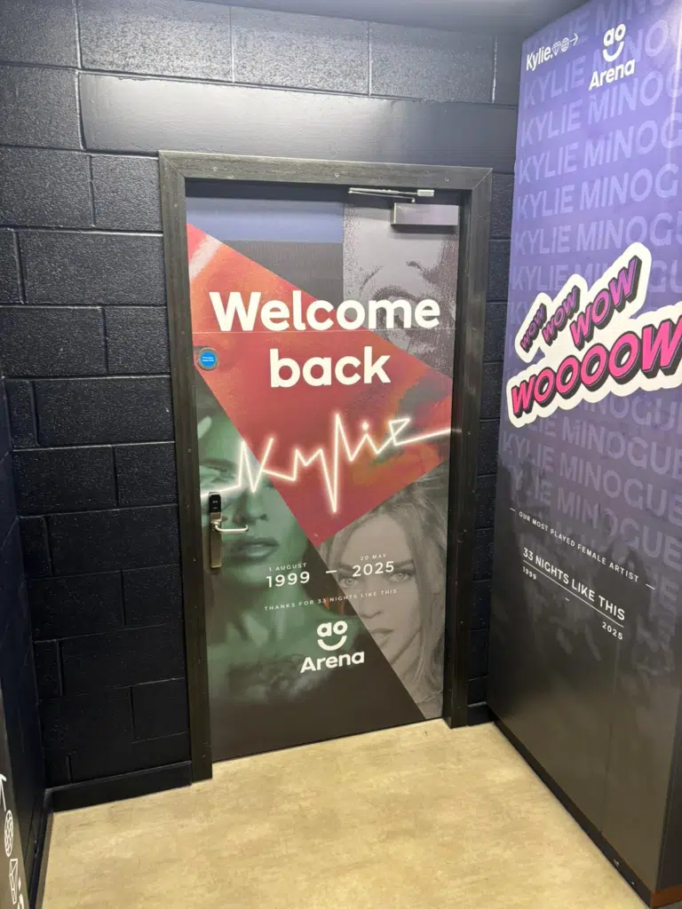 'Welcome back Kylie' door and wall graphics at AO Arena