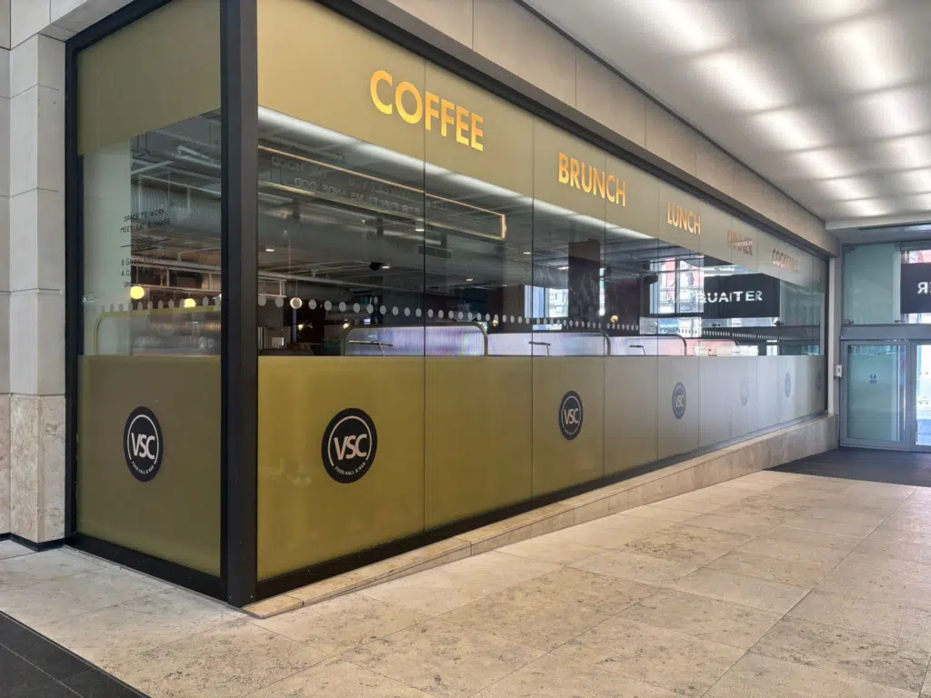 Branded coffee kiosk graphics at Metquarter Liverpool