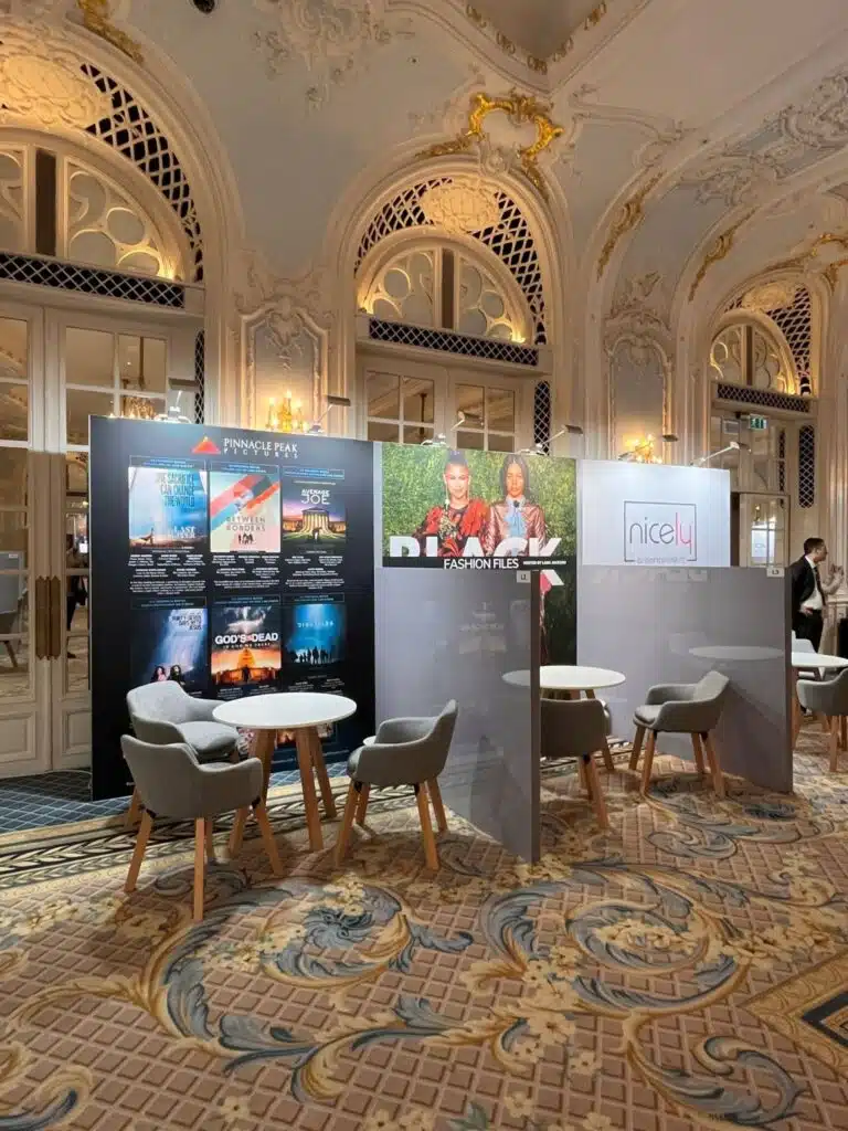 Exhibition stand with graphics in an ornate hall at MIP London
