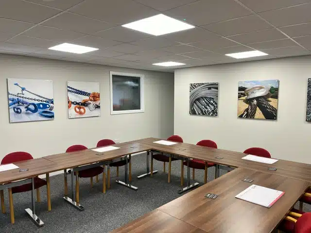 Meeting room with printed wall panels at Rope and Sling Specialists