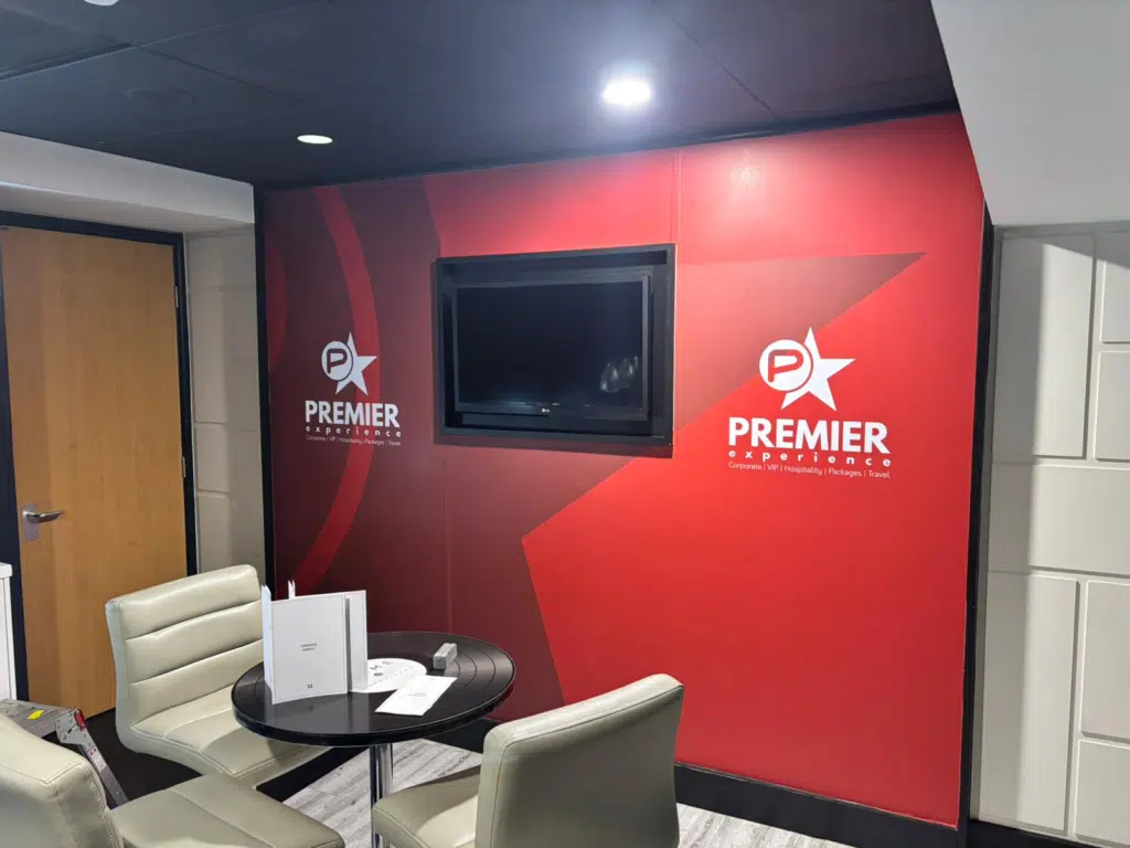 Red Premier suite wall graphics at AO Arena