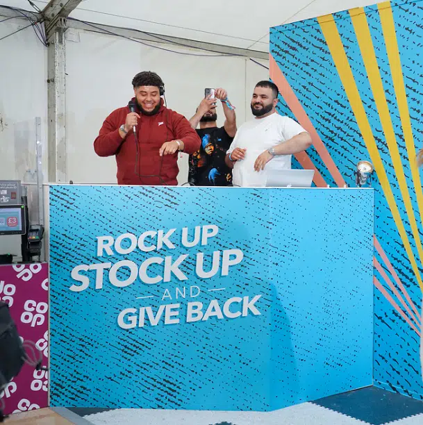 'Rock up, stock up and give back' Co-op booth graphics