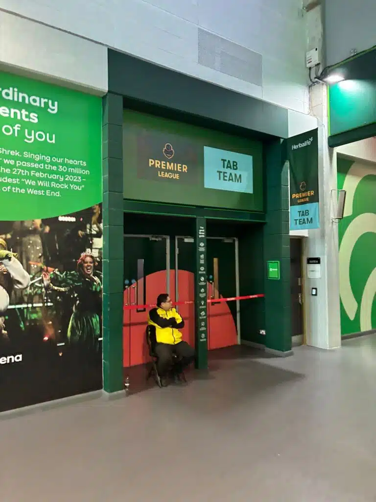 Herbalife green entrance graphics at an arena event