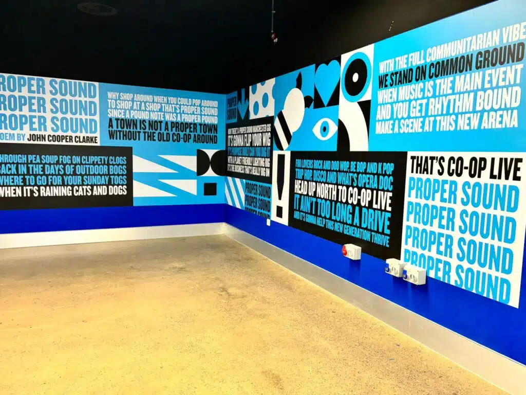 Co-op Live blue and white typographic internal wall graphics