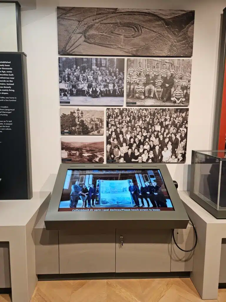 Interactive display and large historic photo graphic at Maesteg Town Hall
